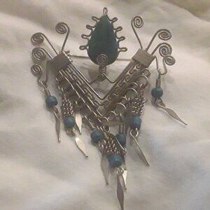 Silver Brooch with Turqouis stone and matching beads...2 inches